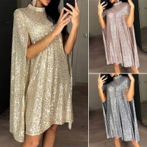 Festklänning med paljetter, elegant stil med krage i Cape-design.
