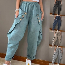 Fashion Solid Color Oblique Button Loose Harlan Pants
