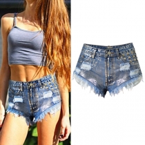 Högmidjade Modenitar Tofsar Jeansshorts