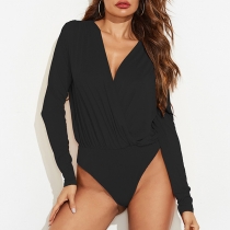 Djup V-ringad body med sexiga puffärmar i enfärgad design