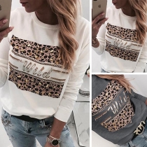 Mode skjorta med rund hals, skarvad och leopardtryckt med rhinestone element