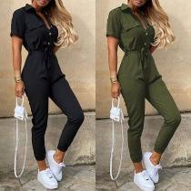 Mode enfärgad kortärmad jumpsuit med hög midja och polokrage (storlek går liten)