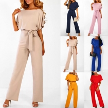 Elegant kortärmad jumpsuit med hög midja och enfärgad design