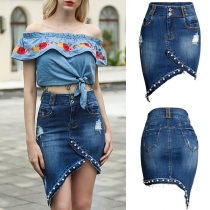 Vintage jeanskjol med ojämn fåll och pärldekoration