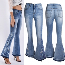 Retro blommiga jeans med utsvängda ben