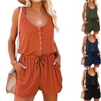Enfärgad ärmlös casual romper med knäppning