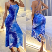 Bodyconklänning i tie-dye med öppen rygg och korslagd halterneck
