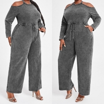 Jumpsuit i plusstorlek med långärmar, axelöppning och halterneck