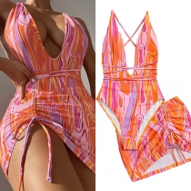 Blommigt mönstrad tvådelad baddräkt med monokini och täckkjol med dragsko