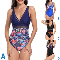 Sexig Monokini med V-ringning och rygglös design i blommigt mönster