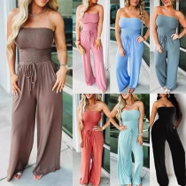Mode Enfärgad Strapless Smocked Bodice Jumpsuit med dragsko i midjan och vida ben