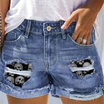 Jeans med vida ben och dödskalletryck: jeansbyxor för kvinnor i mellanstorlek