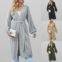 Avslappnad enfärgad långärmad självknytande stickad cardigan med lång linje