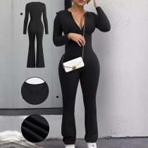 V-ringad långärmad åtsittande ribbad jumpsuit