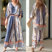 Set med blommönster: tvådelad outfit med blus och byxor