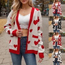 Långärmad cardigan med hjärtmönster i stickat tyg