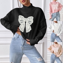 Mock hals långärmad broderad tröja med rosett
