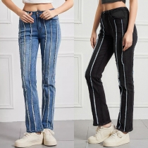 Stretchiga retrojeans med hög midja och ränder