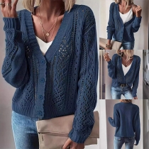 Bekväm stickad enfärgad cardigan med hålmönster framtill och långa ärmar med knappar