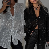 Långärmad Bling-bling-blus med paljetter och ståkrage