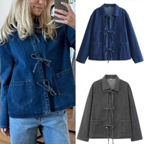 Långärmad jeansjacka med ståkrage och rosett framtill