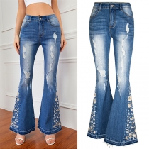 Vintage slitna blommiga broderade högmidjade vida ben gammaltvättade jeans