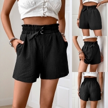 Elastiska midja shorts med självknuten midja och sidofickor