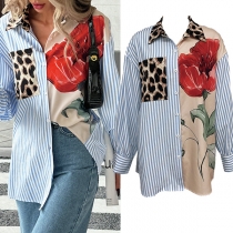 Trendig blus i leopard- och blomtryck med vertikala ränder