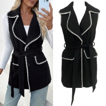 Oversize-väst med kavajslag och vita whipstitch-sömmar