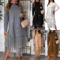 Trendig midiklänning med hög krage, långa ärmar, sidodragkedja och panelerad fåll