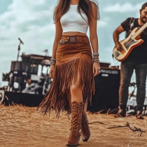 Kjol – vintageinspirerad högmidjad modell med tofsar och ojämn fåll