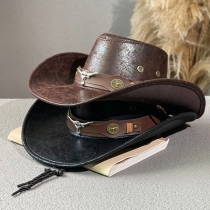 Herrhatt i vintage-stil i patinerat konstläder – cowboy/outback-look med Longhorn-emblem och justerbart hakband
