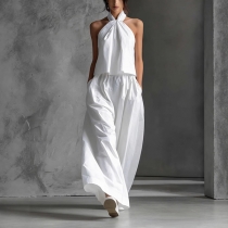 Tvådelat set för dam – halternecktopp och vida byxor, somrig resortoutfit