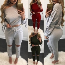 Mode Sidoknytning Sned Axel Crop Tops + Cut-out Knäbyxor Tvådelset